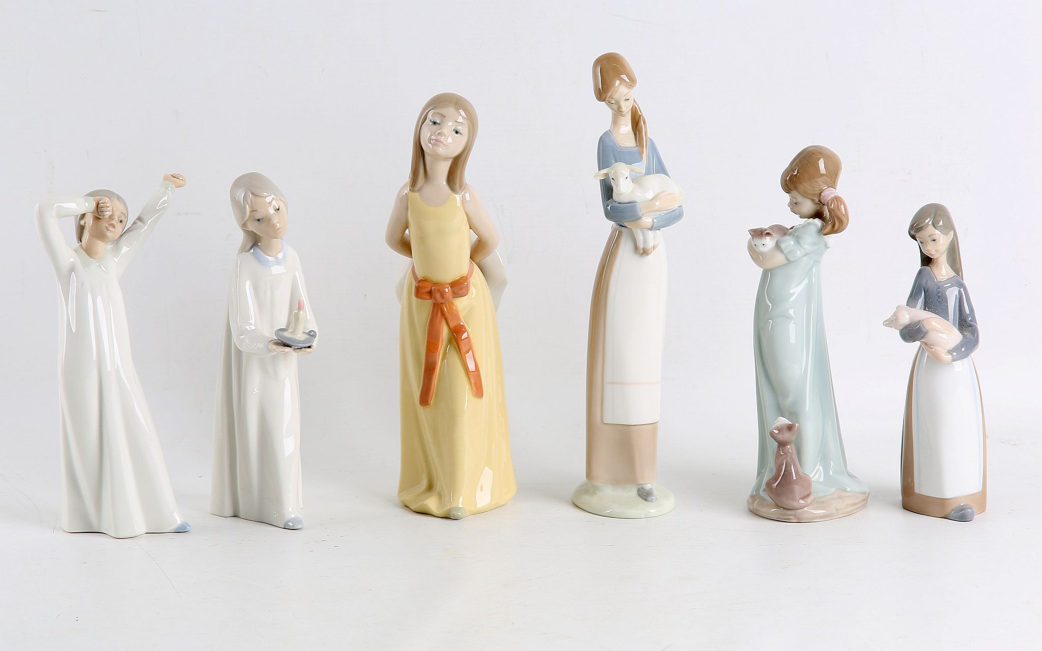 A collection of Lladro porcelain, to include four figures of ducks, and five figures of girls, one - Image 3 of 4