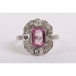 An Art Deco style 18K white gold, pink sapphire and diamond set dress ring. Sapphire: 2ct est.