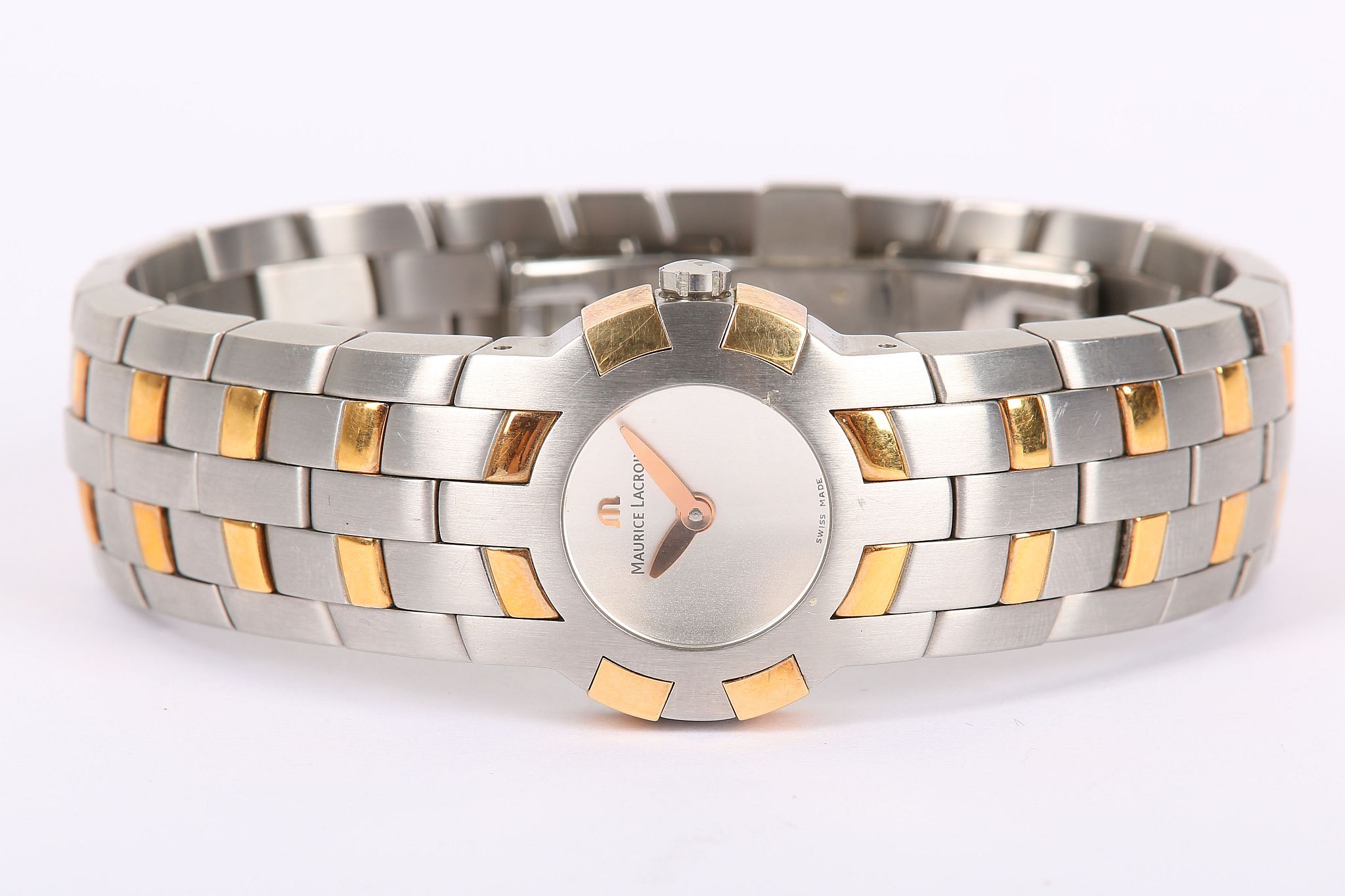 MAURICE LECROIX. A ladies stainless steel and 18K gold bracelet watch. Quartz.