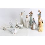 A collection of Lladro porcelain, to include four figures of ducks, and five figures of girls, one