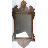 George I style parcel gilt walnut fret cut wall mirror with scallop shell pediment 70 cms H