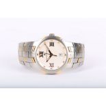 MAURICE LACROIX. A gents stainless steel and 18k gold calendar bracelet watch. Quartz.