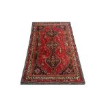 A Persian Shiraz carpet, South West Iran, 2.55m x 1.62m, condition rating A/B, sold with a mid