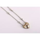 An 18K gold and diamond set heart pendant necklace. Main diamond: 1.32ct