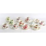 AMENDED - A twelve piece Royal Albert tea cups and saucers from the "Flowers of the Month" series