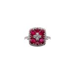 A ruby and diamond dress ring The rectangular plaque set with oval, pearl and circular-cut rubies,