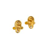 A pair of gold and diamond-set cufflinks Each terminal realistically modelled as an 18 carat gold