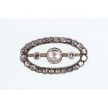 A 19th century diamond brooch Of openwork oval design, set with rose and table-cut diamonds, to a