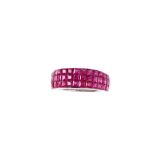 A ruby dress ring Set to the front with courses of French-cut rubies, ring size L½