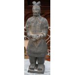 A 20th Century, large ornamental Chinese terracotta model of ancient tomb warrior, in dark glazes,