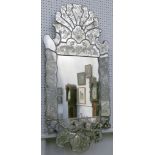 A 18th / 19th century Venetian wall mirror, having individual shaped, etched and engraved panels