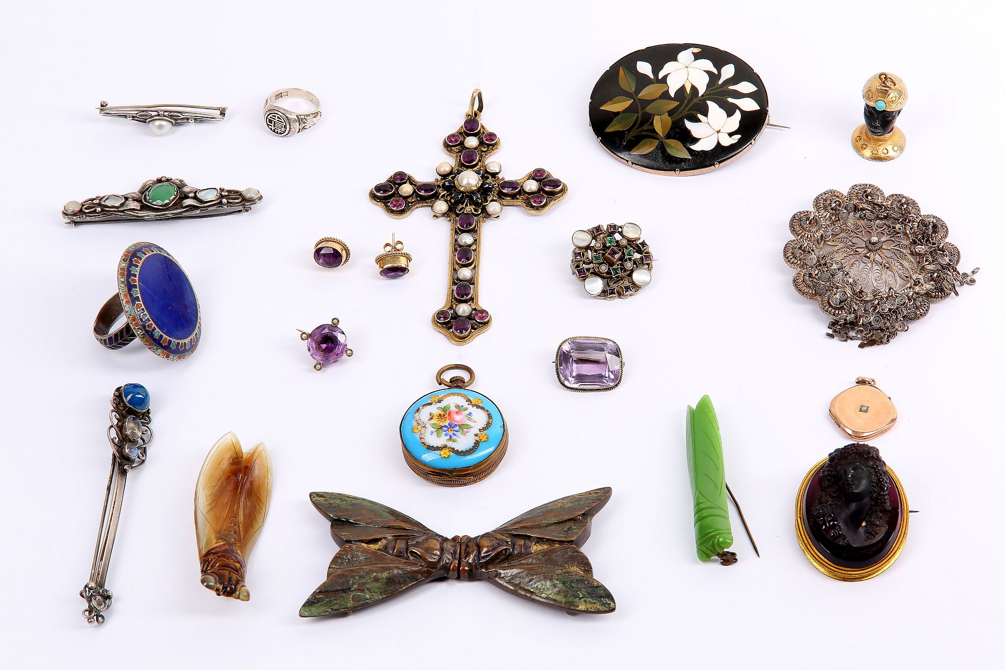 A collection of jewellery, Including a purple paste cameo, a paste, enamel and half pearl cross