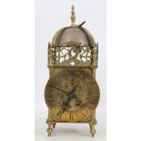 A 17th Century style brass lantern clock, circa late 19th/ early 20th century, the central urn-