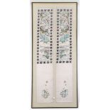 A pair of 20th Century Chinese embroidered panels of silk, depicting flora, fauna and script,