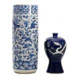 A large Chinese cylindrical blue and white vase, damaged with repairs, with a Chinese blue vase with