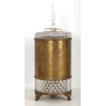 A MIDDLE EASTERN STYLE BRASS AND CUT GLASS WASTE PAPER BASKET of cylindrical form, the body with