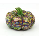 An early 20th Century Persian cloisonne enamelled pot and cover in the form of a squash.