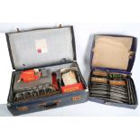 A boxed Hornby tin plated train set, with a selection of later '00' gauge Triang trains set