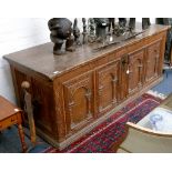 A large early 17th Century Danish oak coffer, the long rectangular top moulded with a thumbnail