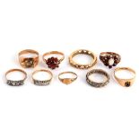 A collection of rings, Including examples set with garnets, imitation diamonds and single-cut