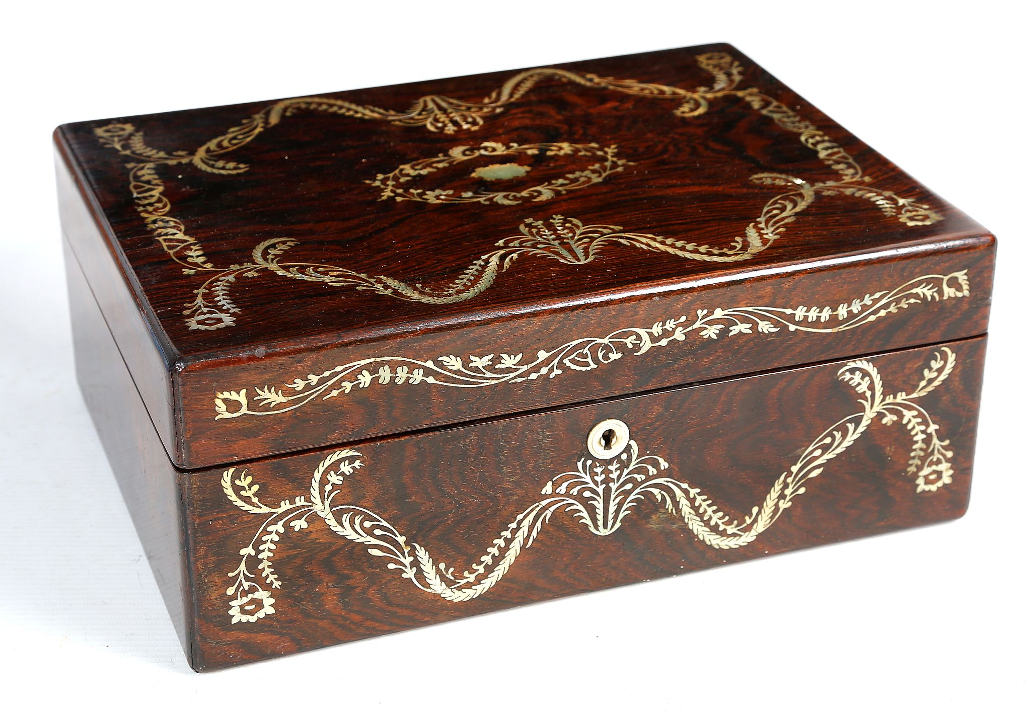 A good Victorian rosewood ladies sewing box and cover, veneered in mother of pearl with scrolling