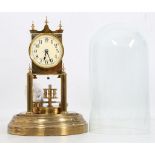 An early 20th century Gustav Becker brass torison or anniversary clock, circa 1925 limited