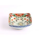 A Chinese square sided bowl, the interior decorated with scrolling flowers, the base with an