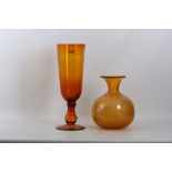 Two mid 20th Century glass vases, one being lustrous amber and in globular form, 32cm high,