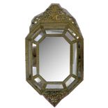 A 19th Century French brass repousse cushion frame mirror, with top pediment and matching lower
