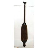 An early 20th Century Amazonian canoe paddle, with traditional geometrical patterns, 134cm long.
