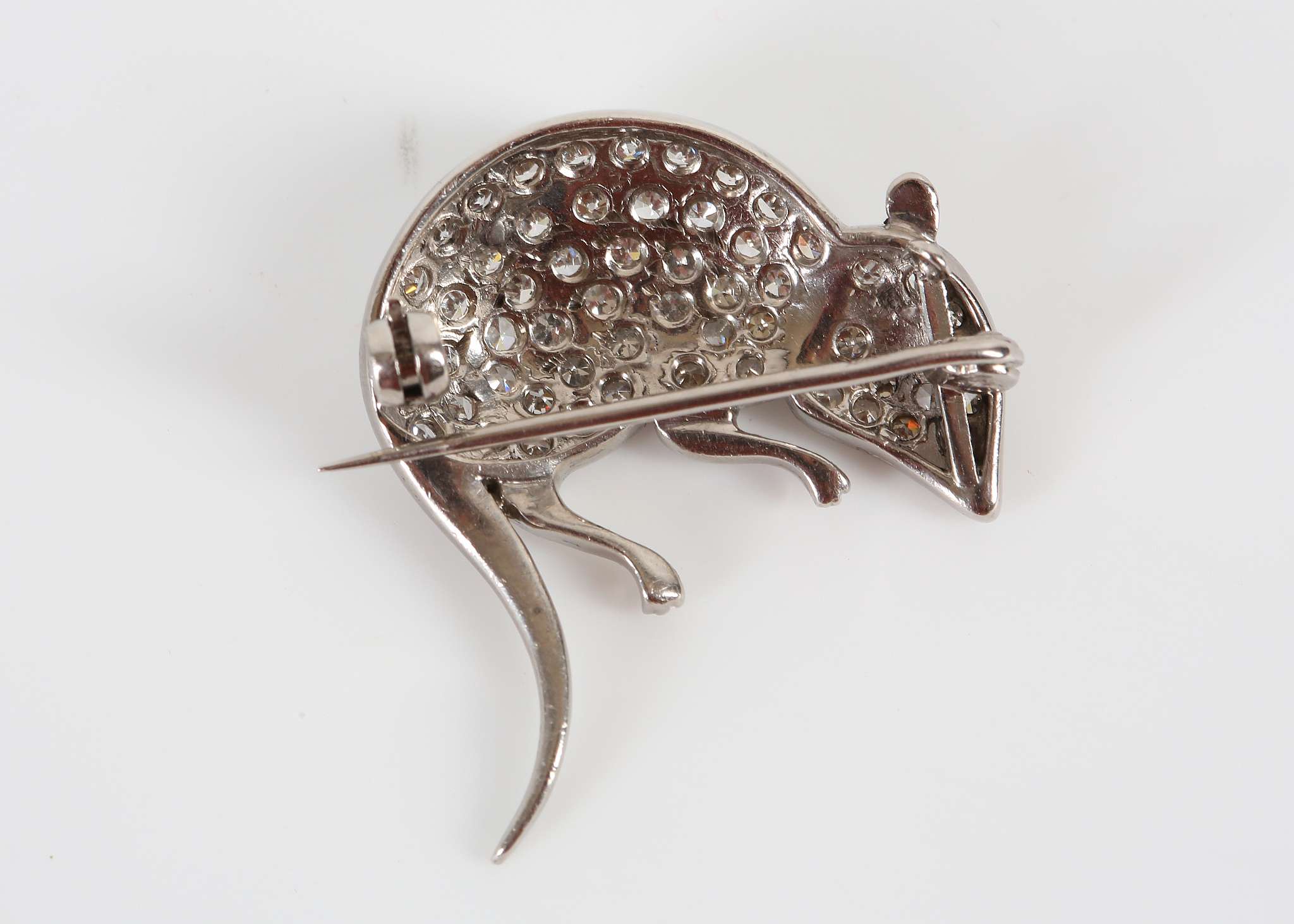 An unusual white gold, diamond set brooch modelled as a rat with ruby eye. - Image 2 of 2