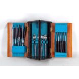A 1960's contemporary cased canteen of stainless steel cutlery by Butler in 'Sheba' design.