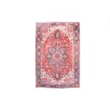 A FINE HERIZ CARPET, NORTH-WEST PERSIA approx: 12ft.4in. x 8ft.9in.(376cm. x 266cm.) The shaded