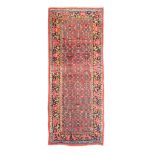 AN ANTIQUE BIJAR RUNNER, NORTH-WEST PERSIA approx: 9ft.11in. x 4ft.2in.(302cm. x 127cm.) The rust-