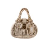 Miu Miu cream Matelasse leather frame handbag, of petite form with short braided handles and gold