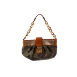 Rare Louis Vuitton Gold Monogram Dentelle Kirsten bag, limited edition created by Marc Jacobs for