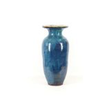 A large baluster vase, late 19th Century, in blue glazes (in the Chinese manner), riveted repairs to