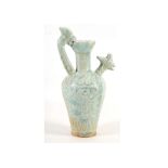 A Chinese Qingbai glazed ewer with cockerel head spout, the body decorated with scrolling flowers,