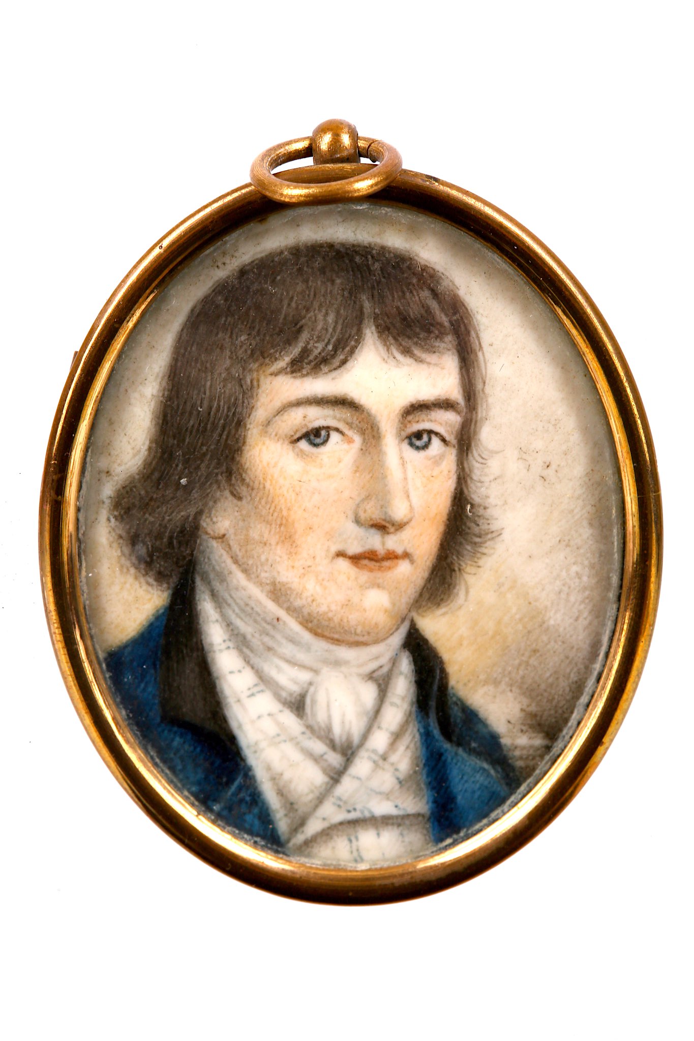 ENGLISH SCHOOL (CIRCA 1800). Portrait miniature of a young Gentleman wearing a blue coat with