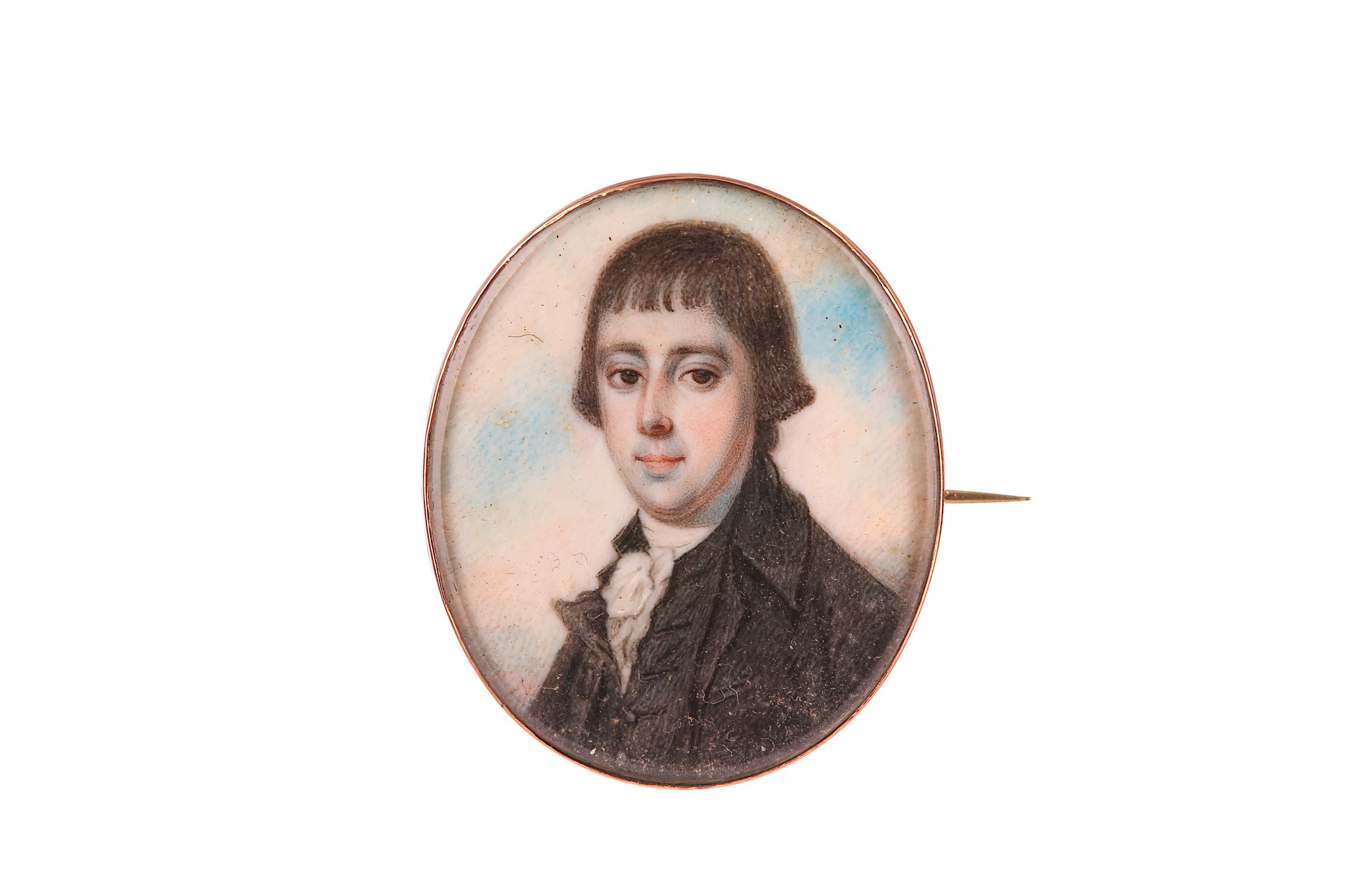 MANNER OF RICHARD CROSSE (1742-1810). Portrait miniature of a young man, wearing a black coat, black