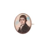 MANNER OF RICHARD CROSSE (1742-1810). Portrait miniature of a young man, wearing a black coat, black