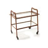 ICO PARISI, ITALY, a 1950's walnut drinks trolley, with removable tray top and lower glass shelf, on