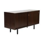 FLORENCE KNOLL FOR KNOLL INTERNATIONAL, 1960s rosewood sideboard with sliding doors and leather pull