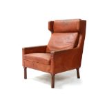 A MODEL 9801 WINGBACK ARM CHAIR, DESIGNED BY ARNE VODDER, MANUFACTURED BY FRITZ HANSEN, circa