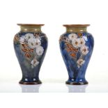 John Huskinson for Royal Doulton  A pair of early 20th century unusual 'Motto Ware' stoneware