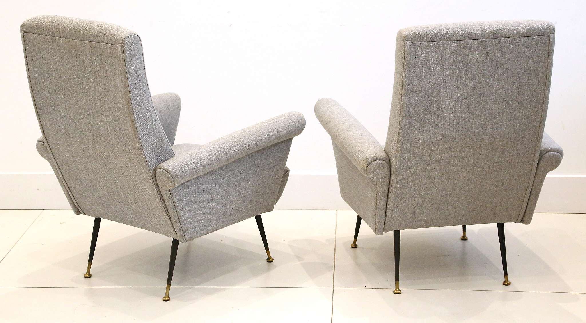 A PAIR OF 1950s ITALIAN ARMCHAIRS, newly upholstered in grey, on black enameled legs, (70cm max wide - Image 2 of 2