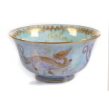 AN ART DECO WEDGWOOD DRAGON LUSTREWARE PEDESTAL BOWL, the interior and exterior colour enameled