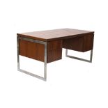 A 1960s ROSEWOOD BESPOKE MADE DESK, in the manner of Merrow Associates, with chrome side