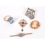 A small collection of jewellery including a shell cameo, a synthetic spinel ring, a bar brooch, a