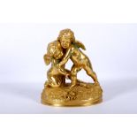 A 19th Century ormolu figural group of Cupid & Psyche on a naturalistic base, signed Cumberworth.